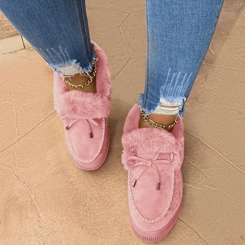 Hand-stitched shoes and snow boots