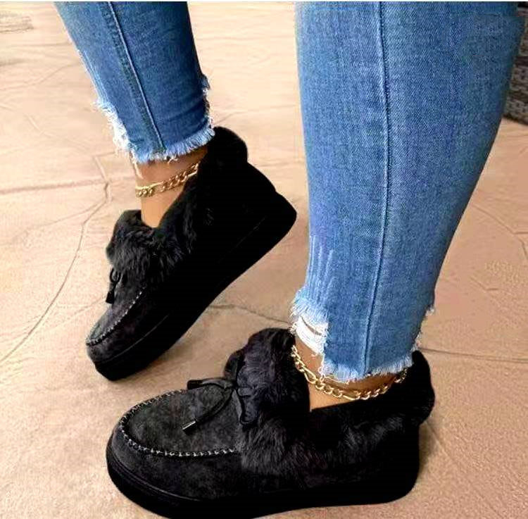 Hand-stitched shoes and snow boots